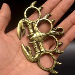 Small Scorpion Style Knuckle Duster for Four-Finger Defense - Image 5