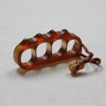 Oversized Amber Pea Knuckle Duster Safety Companion