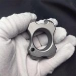 Portable Multifunctional Knuckle Duster with Bottle Opener Feature