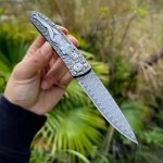 Vintage Handle Folding Knife Featuring a Damascus Steel Blade - Imagen 8